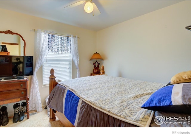 bedroom featuring carpet and ceiling fan