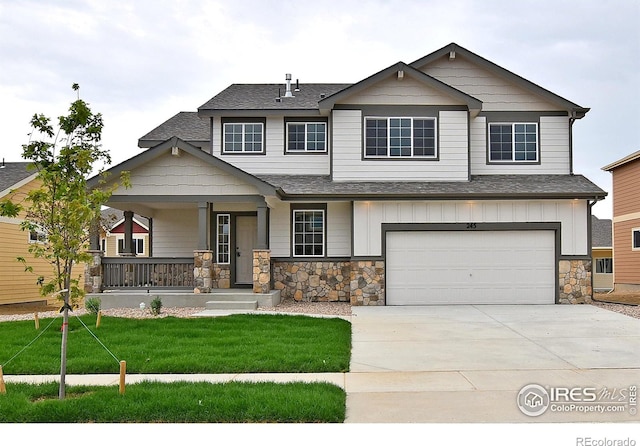708 85th Avenue Ct, Greeley, CO 80634 - craftsman house with a porch, concrete driveway, roof with shingles, a front lawn, and a garage