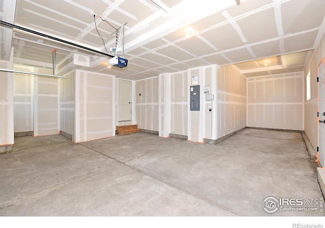 708 85th Avenue Ct, Greeley, CO 80634 - garage with a garage door opener and electric panel