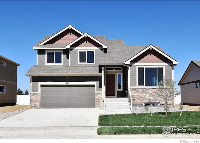 craftsman-style house featuring a garage