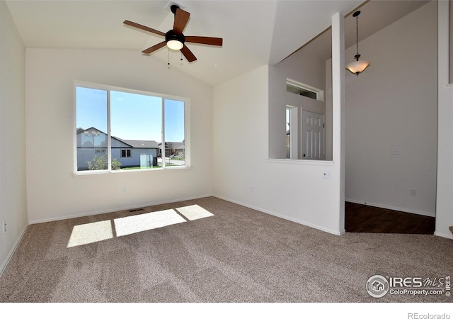 unfurnished room featuring carpet, ceiling fan, and lofted ceiling