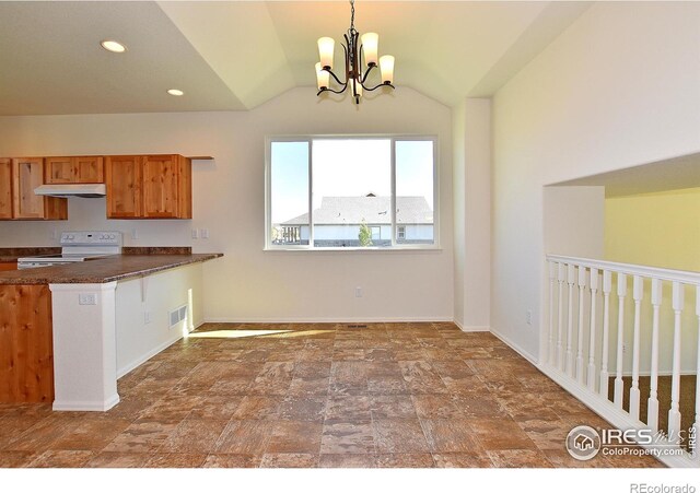 kitchen featuring electric stove, dark countertops, brown cabinets, under cabinet range hood, and a notable chandelier