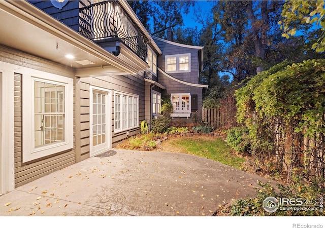 view of home's exterior with a patio area