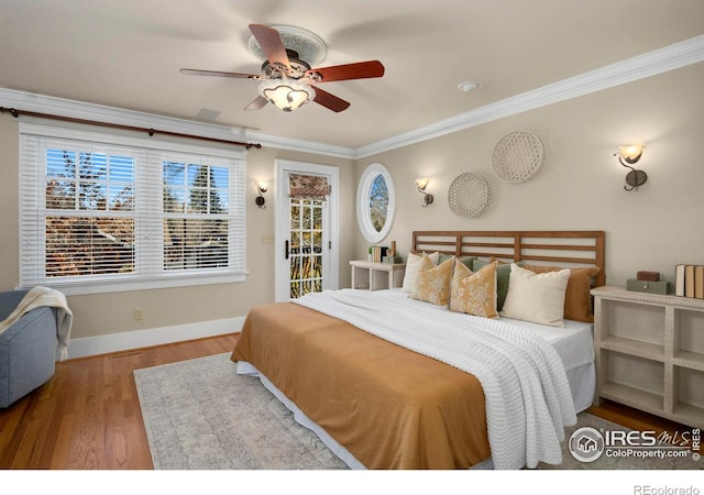 bedroom with access to exterior, ceiling fan, crown molding, and hardwood / wood-style flooring