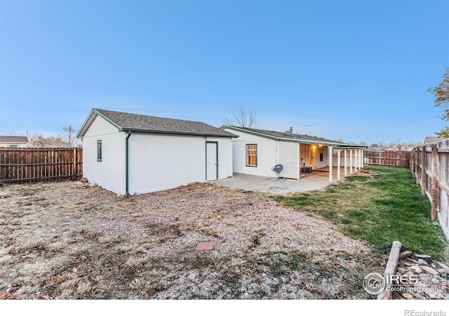 back of property featuring a patio area