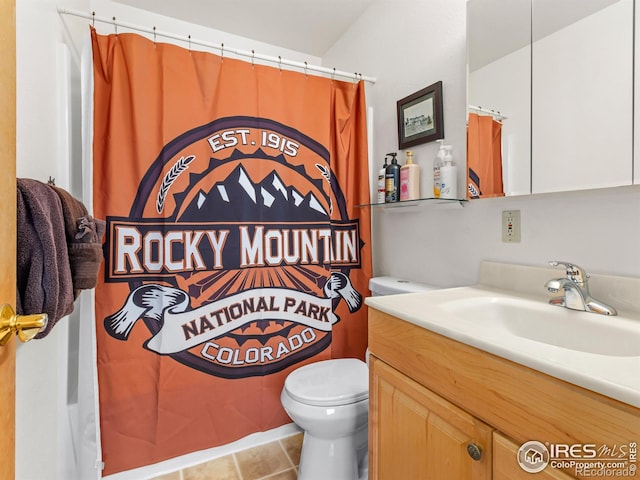 220 Virginia Dr Unit 8, Estes Park, CO 80517 - full bath featuring vanity, tile patterned floors, and a shower with shower curtain