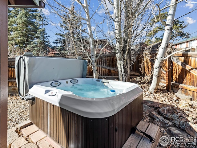 220 Virginia Dr Unit 8, Estes Park, CO 80517 - wooden deck featuring a hot tub