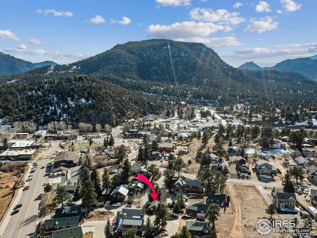 drone / aerial view featuring a mountain view