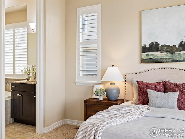 bedroom with multiple windows