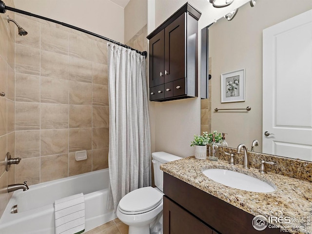 full bathroom with tile patterned floors, vanity, shower / bath combination with curtain, and toilet