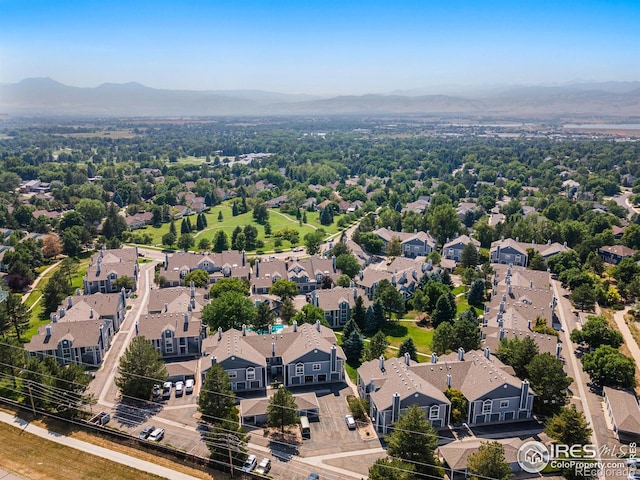 drone / aerial view featuring a mountain view