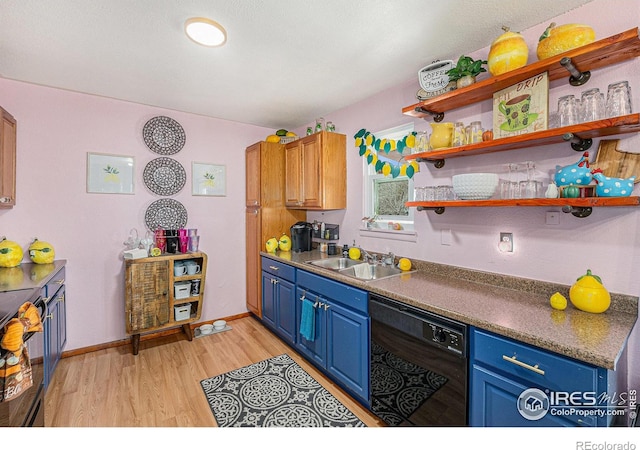 kitchen featuring dishwasher, light wood-type flooring, sink, and blue cabinets