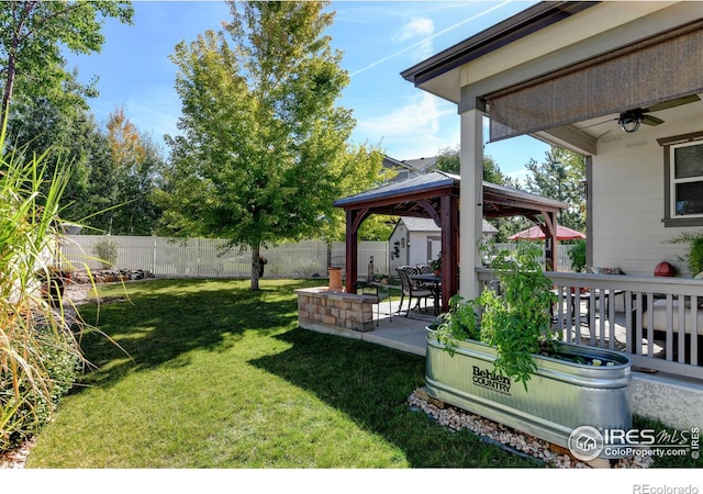 view of yard with a gazebo and a patio