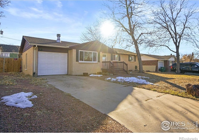 ranch-style home with a garage