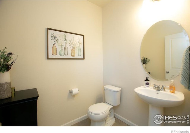 bathroom featuring toilet