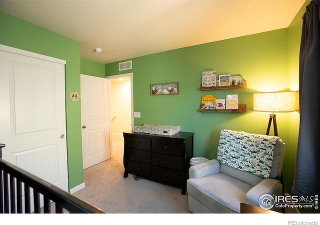 bedroom with light colored carpet