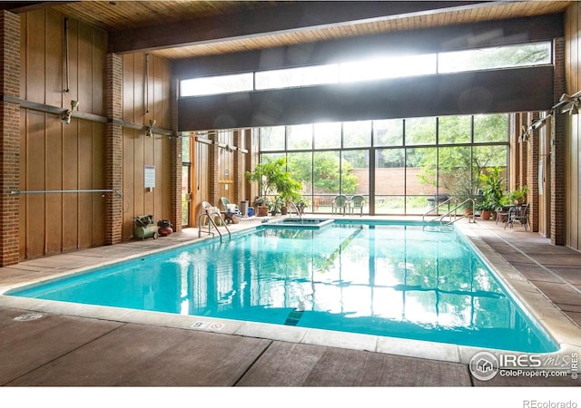 1850 Folsom St Unit 611, Boulder, CO 80302 - view of pool featuring a lanai, a patio area, and a pool with connected hot tub