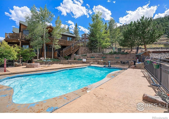 view of pool featuring a patio area