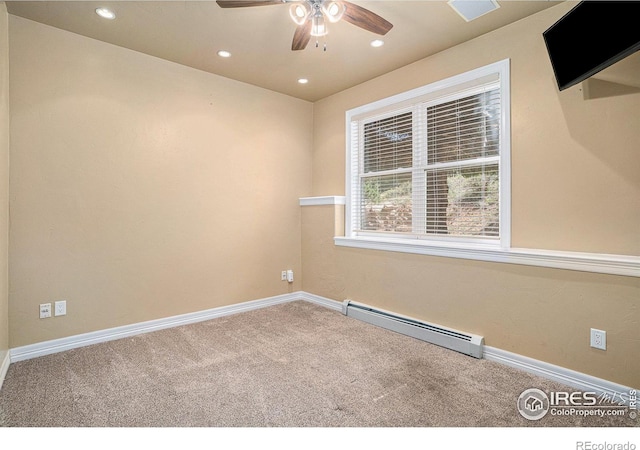 unfurnished room featuring ceiling fan, a baseboard radiator, and carpet