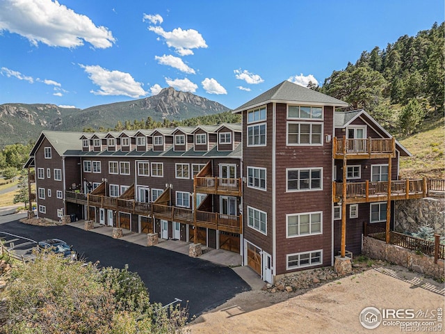 view of building exterior featuring a mountain view