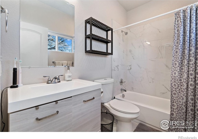 full bathroom with vanity, toilet, and shower / tub combo with curtain