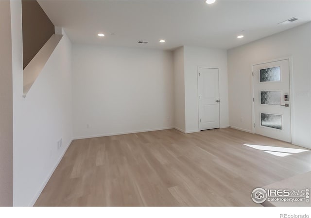 5086 Mckinnon Ct, Timnath, CO 80547 - empty room with light wood finished floors and recessed lighting