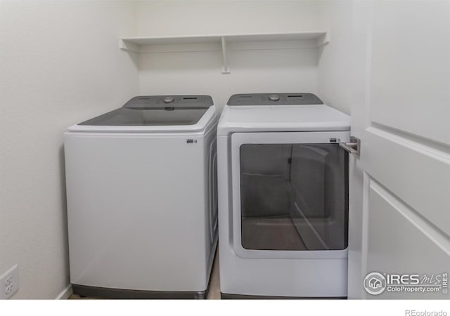 5086 Mckinnon Ct, Timnath, CO 80547 - laundry area with washing machine and dryer