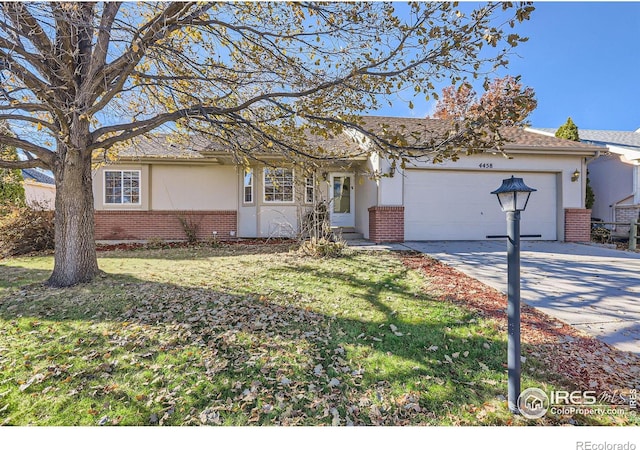 view of front facade with a front lawn and a garage