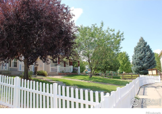 exterior space with a front lawn