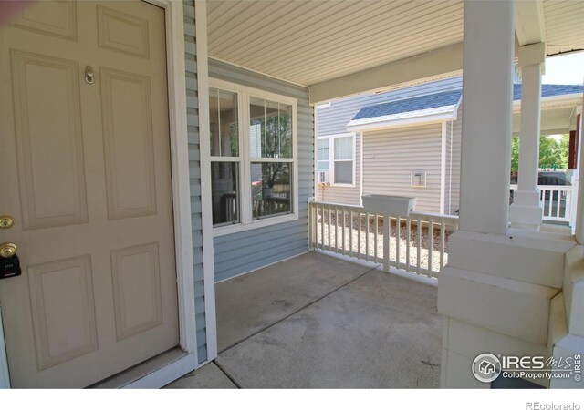 view of patio featuring a porch