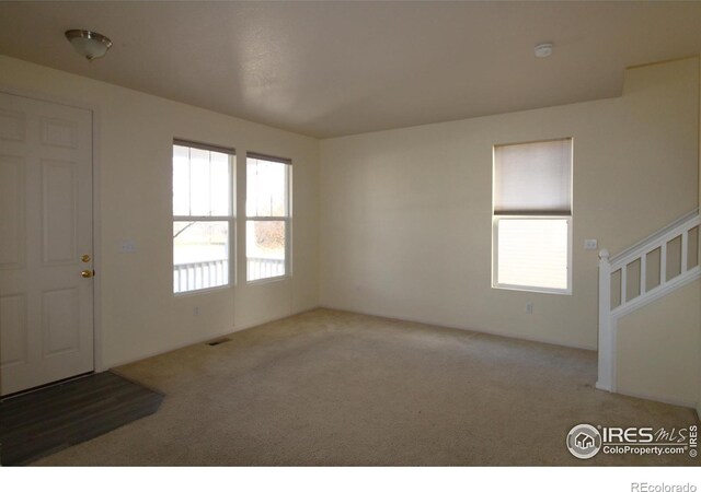 view of carpeted spare room