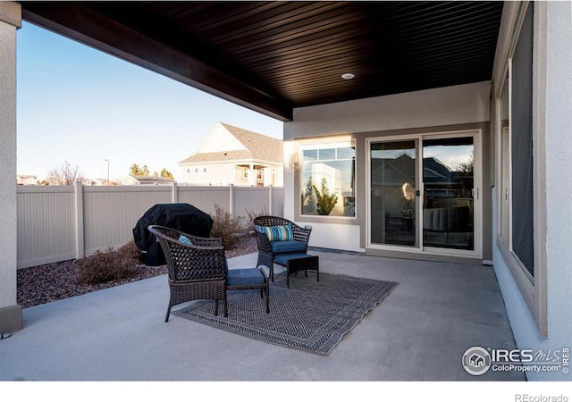 view of patio / terrace with fence