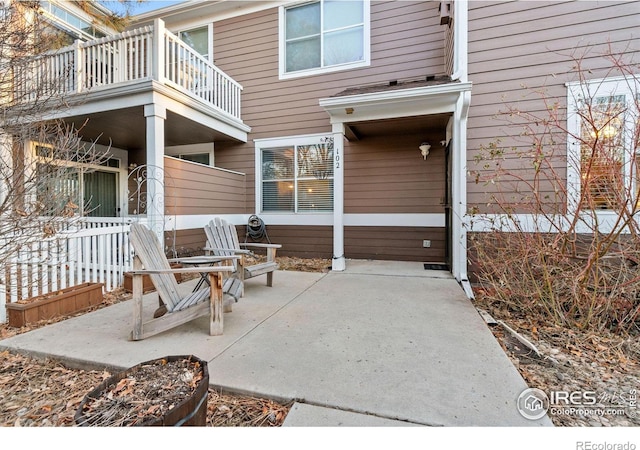 view of patio with a balcony