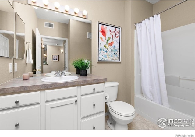 full bathroom with tile patterned flooring, vanity, shower / tub combo with curtain, and toilet