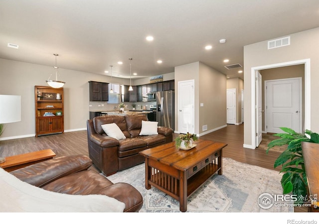 living room featuring light hardwood / wood-style floors