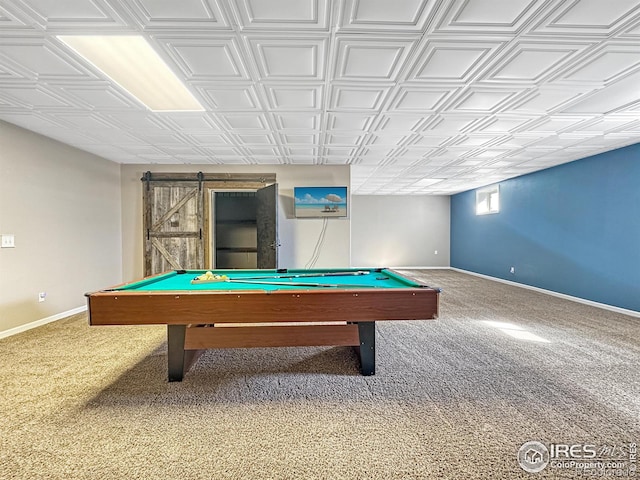 playroom with billiards, a barn door, and carpet flooring