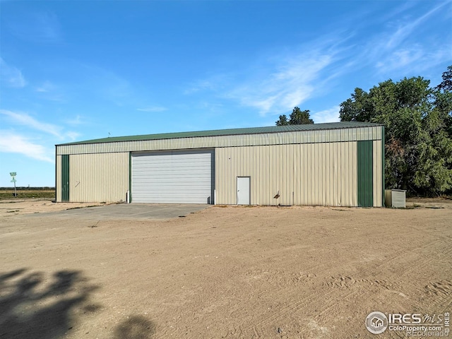 view of outdoor structure with a garage