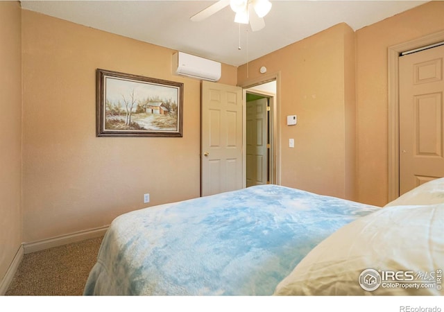 bedroom with a wall unit AC, ceiling fan, and carpet