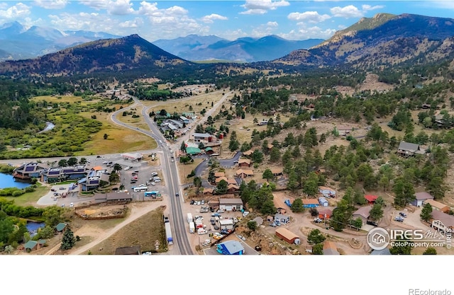 drone / aerial view featuring a mountain view