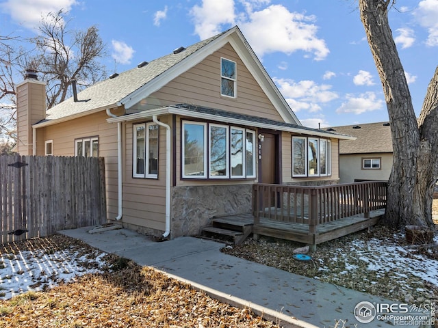 view of front of property featuring a deck