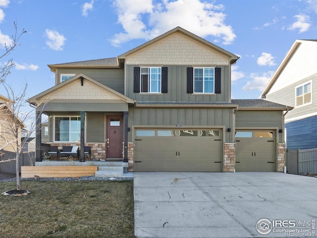 craftsman house with a garage