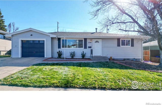 ranch-style house with a front yard and a garage