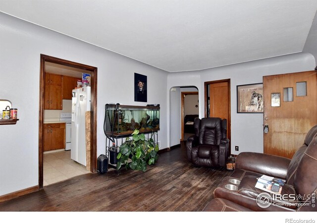 living room with light hardwood / wood-style floors