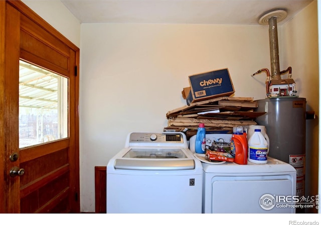 laundry area featuring washer and dryer and gas water heater