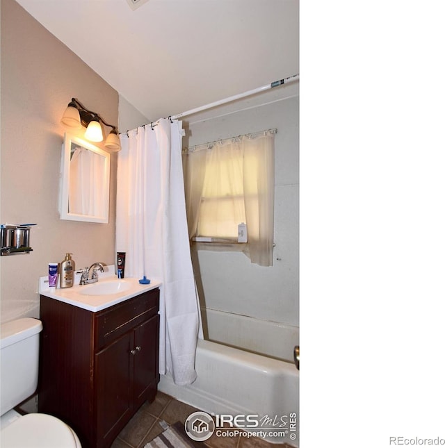 full bathroom with tile patterned flooring, vanity, toilet, and shower / bath combo