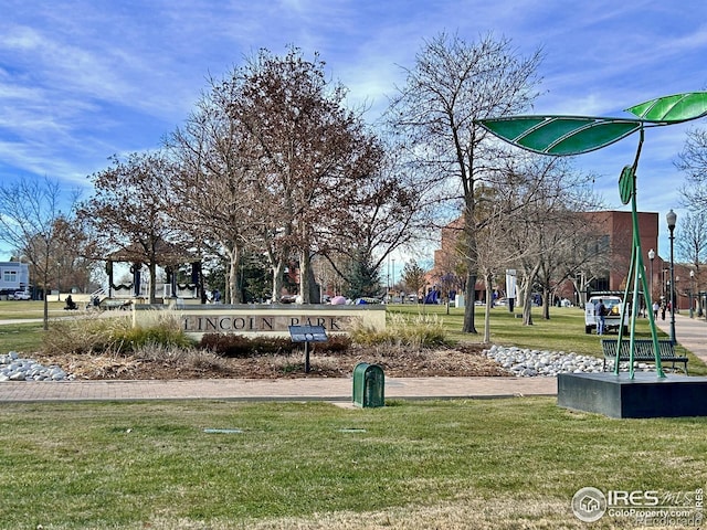 view of home's community featuring a yard