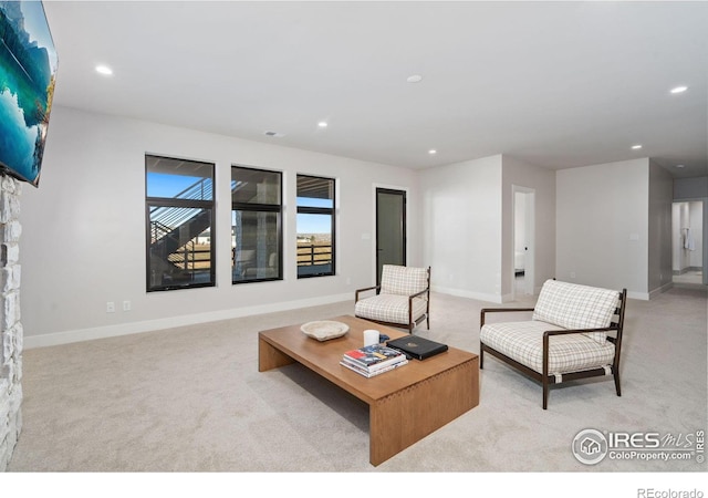 living room with light carpet