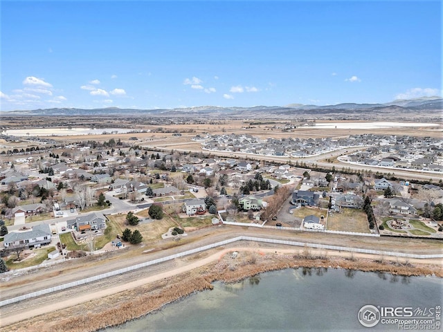 aerial view with a water and mountain view