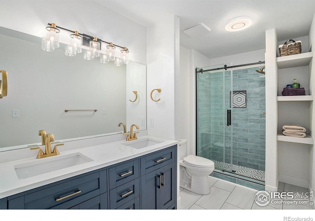 bathroom featuring a textured ceiling, vanity, tile patterned flooring, toilet, and a shower with shower door