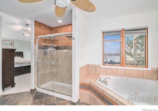 bathroom with ceiling fan and plus walk in shower